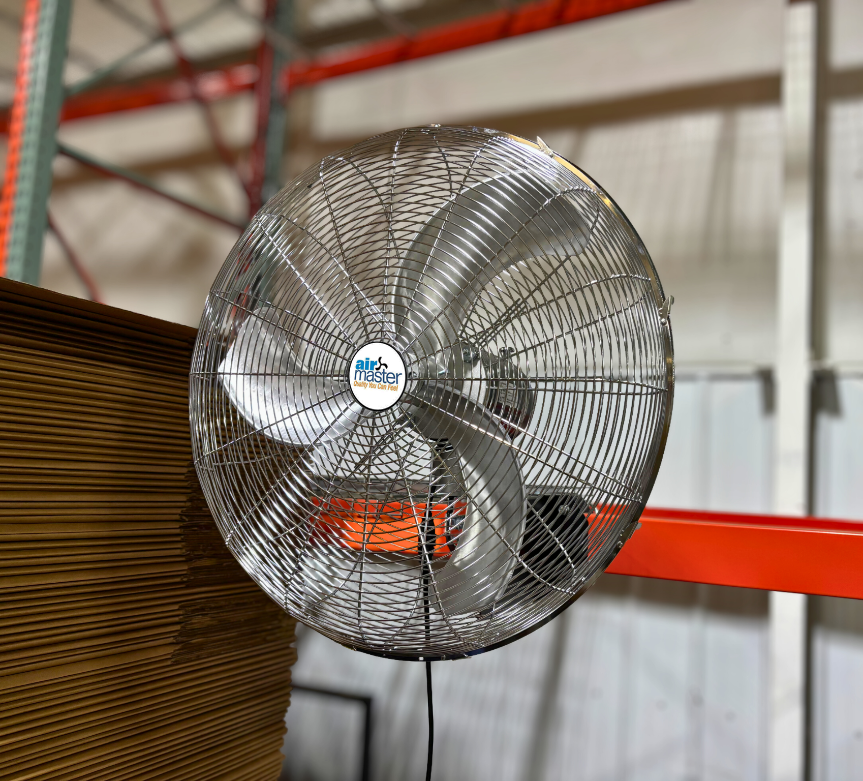 Airmaster heavy-duty fan on i-beam mount in industrial facility